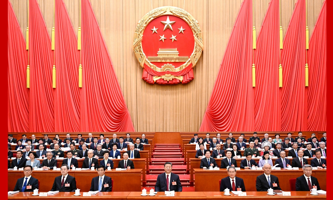十四届全国人大三次会议在京开幕 习近平等在主席台就座